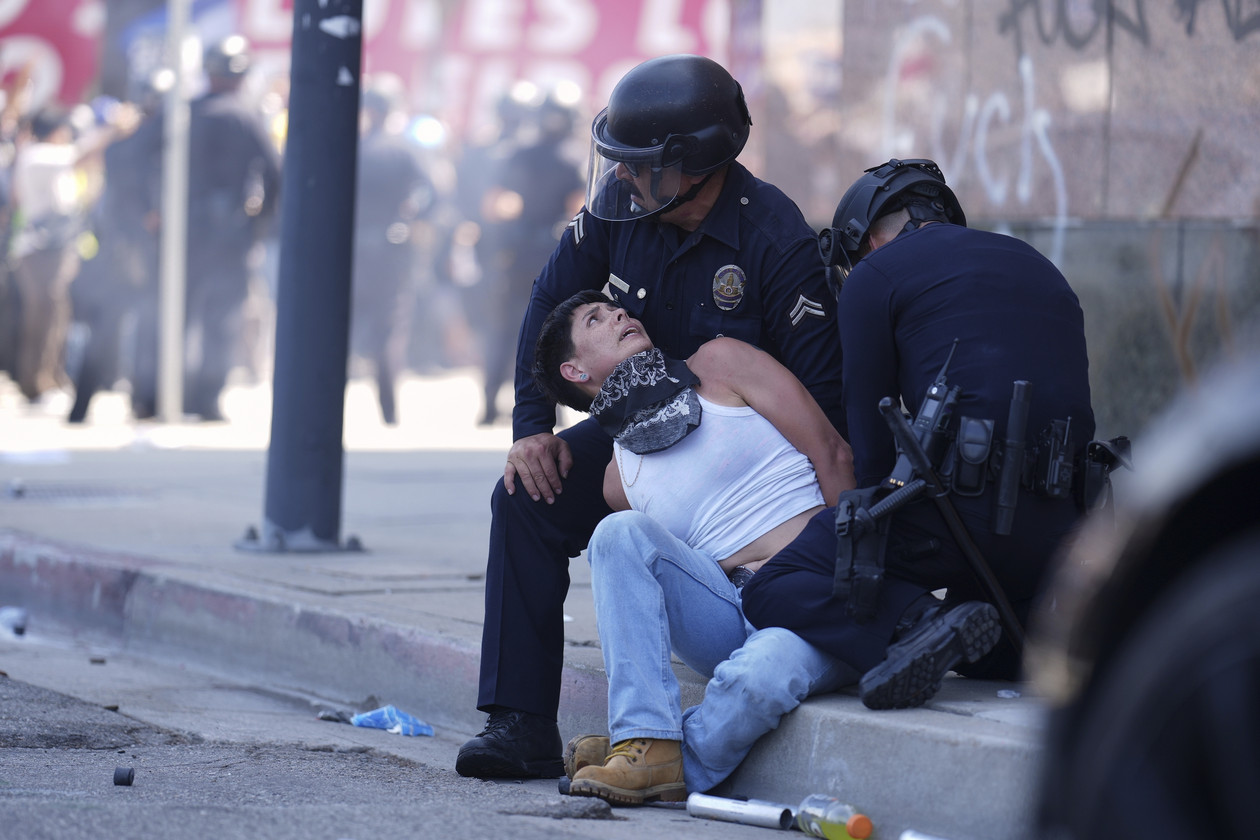 A-protester-is-detained-in-downtown-Los-Angeles-on-June-8-2025